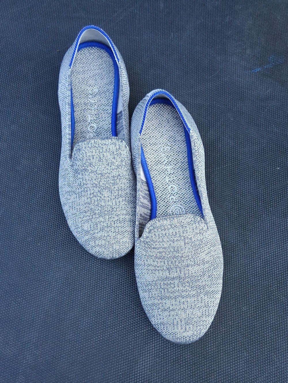 Rothy's Gray Knit Slip-On Flats with Blue Trim Accent